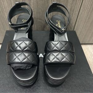 Brand new !! Original price was $1500. 
CHANEL Black Quilted Platform Sandals